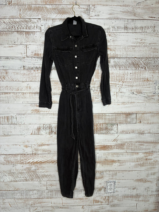 Long sleeve jumpsuit with red, black, and silver snake patch on back.&nbsp;